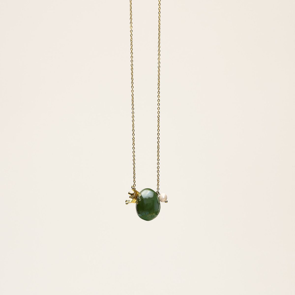 blair in green necklace