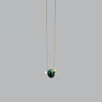 blair in green necklace